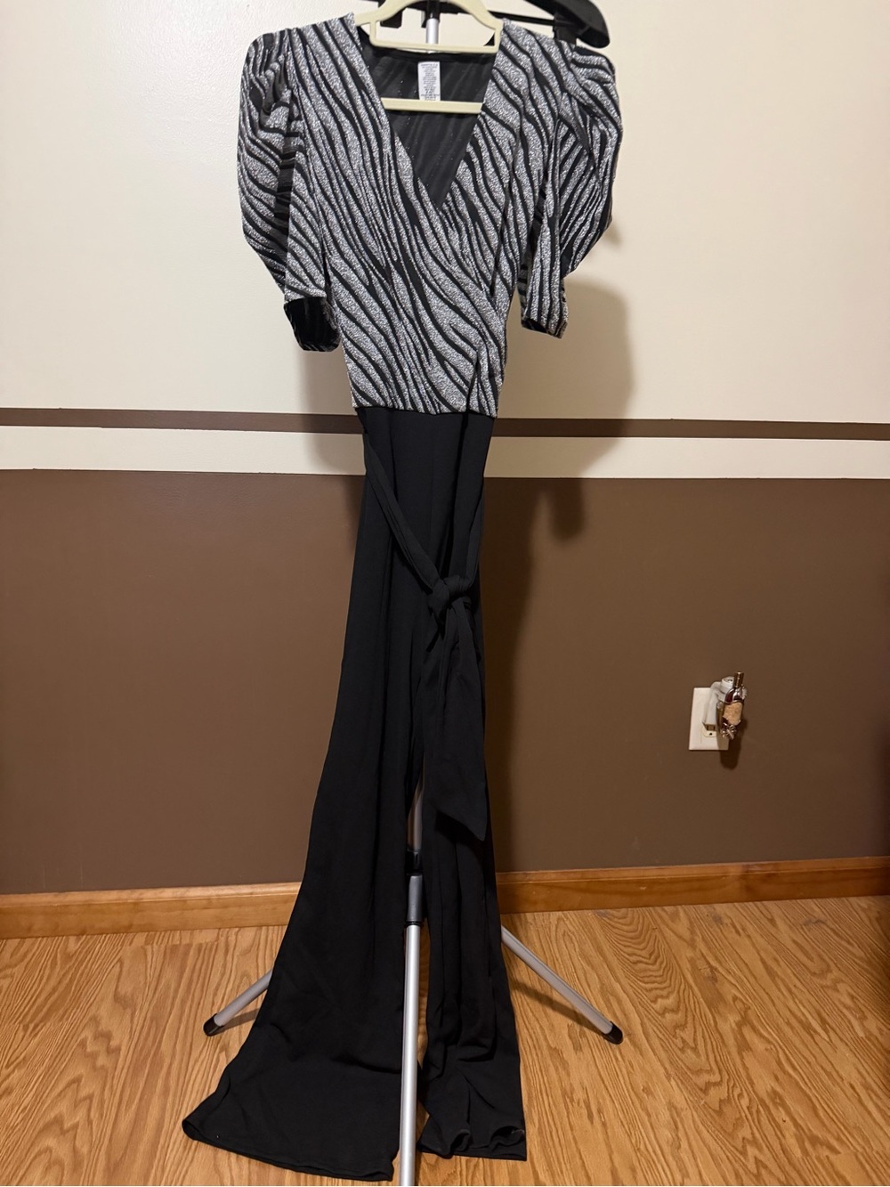 Black & Silver V-Neck Wrap Jumpsuit with Puff Sleeves by Janette.